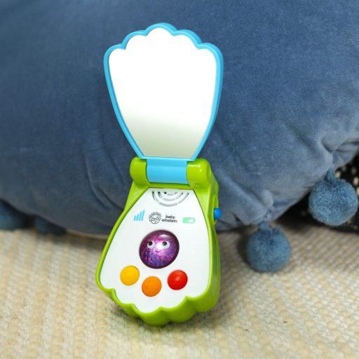 BABY EINSTEIN Zenélő játék telefon Shell Phone™ 6hó+