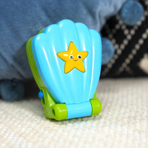 BABY EINSTEIN Zenélő játék telefon Shell Phone™ 6hó+