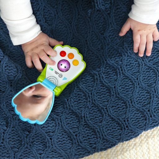 BABY EINSTEIN Zenélő játék telefon Shell Phone™ 6hó+