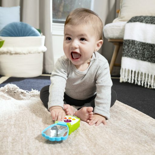 BABY EINSTEIN Zenélő játék telefon Shell Phone™ 6hó+