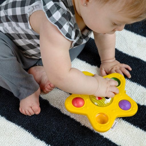 BABY EINSTEIN Aktív játék tapadókoronggal Pop & Glow Starfish™ 6hó+