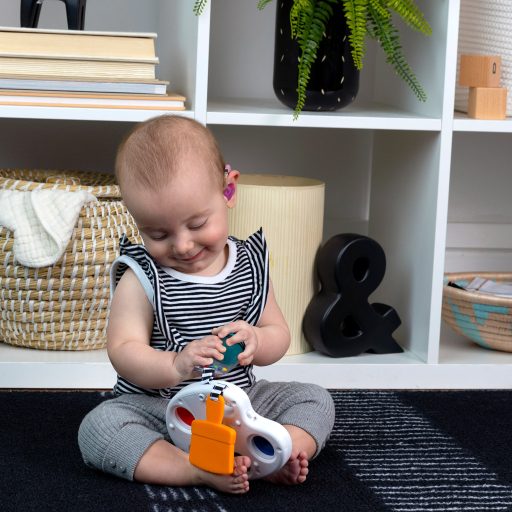 BABY EINSTEIN Zenélő érzékszervi játék Color Palette Popper 6-36hó